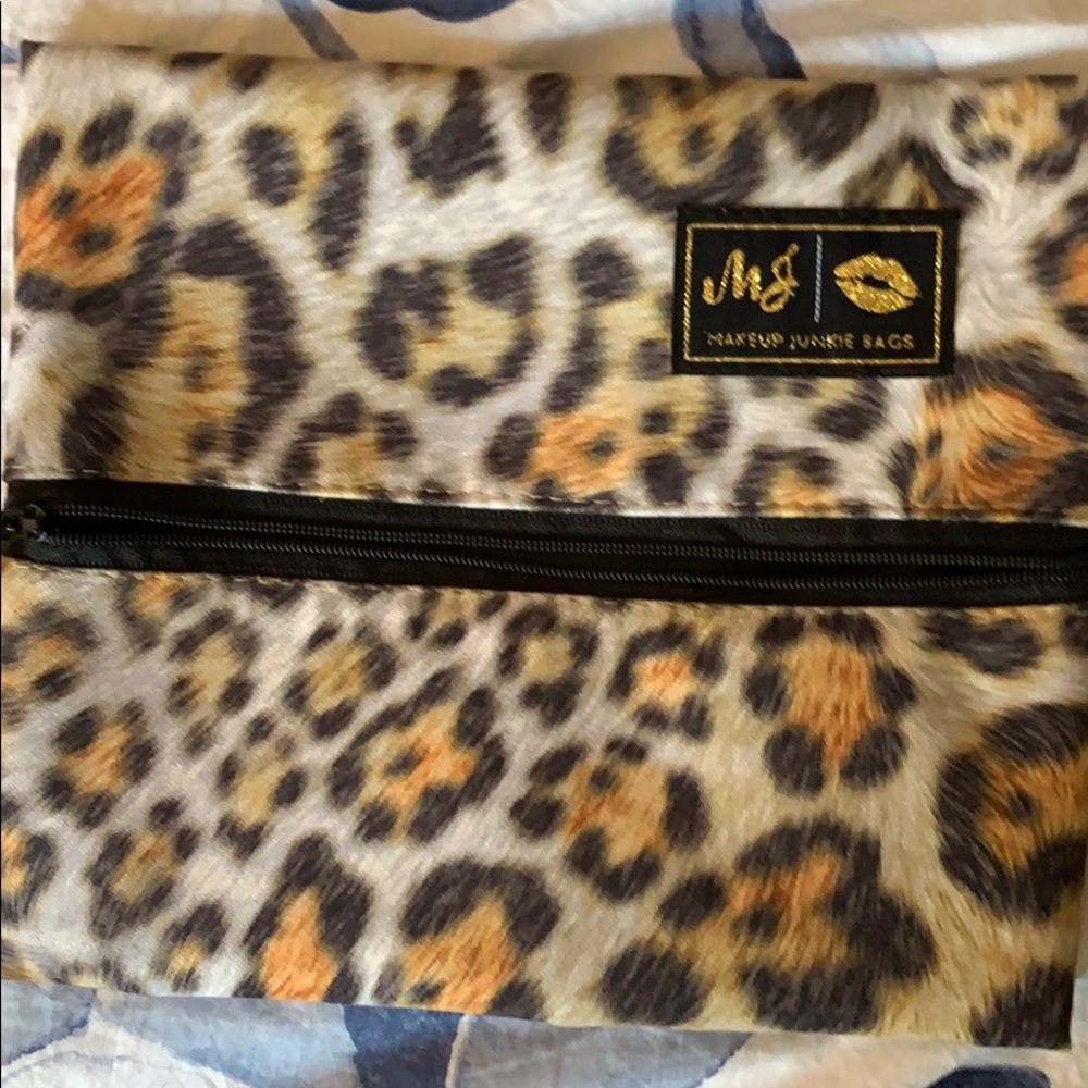 Make up Junkie bag NWT gold label